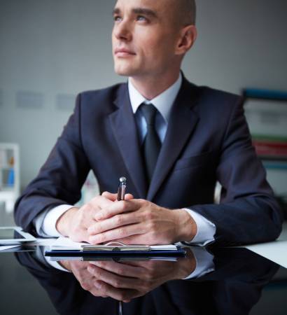 Pensive businessman Image of pensive businessman at workplace