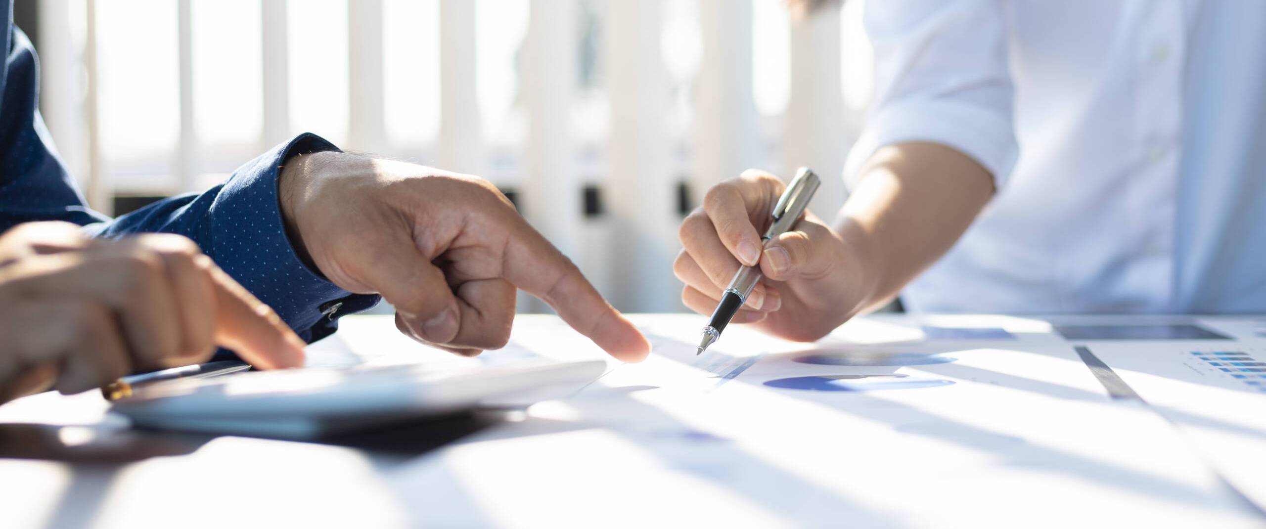 business-consultant-meeting-analyzes-marketing-gro-2025-03-23-19-13-42-utc Business consultant meeting analyzes marketing growth research and business strategy planning. Investment data analysis financial planning and accounting.