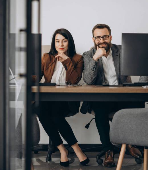 Two business partners working together in office