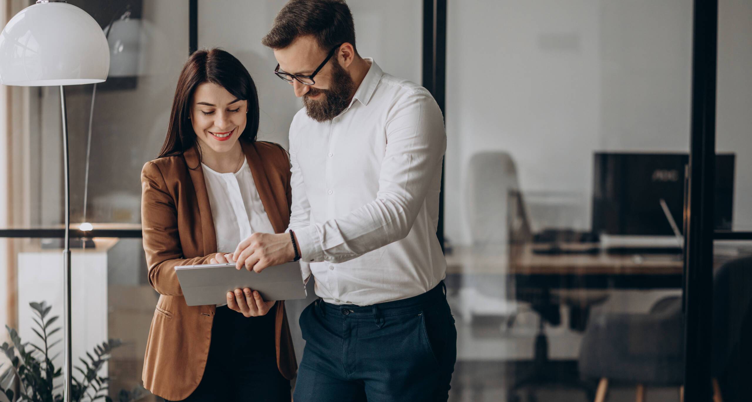 Two business partners working in office Two business partners working in office