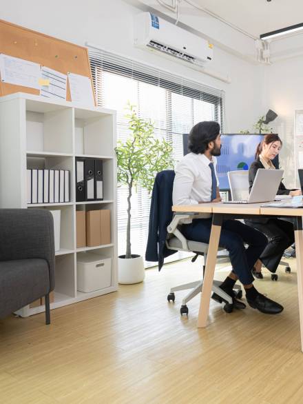 In a contemporary office, a group of senior executives with a mi In a contemporary office, a group of senior executives with a mission to approve new projects and monitor the progress of business projects