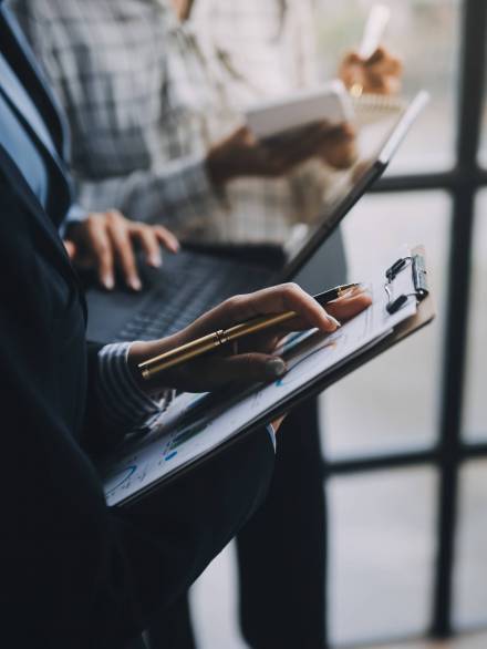 Fund managers team consultation and discuss about analysis Inves Fund managers team consultation and discuss about analysis Investment stock market at office